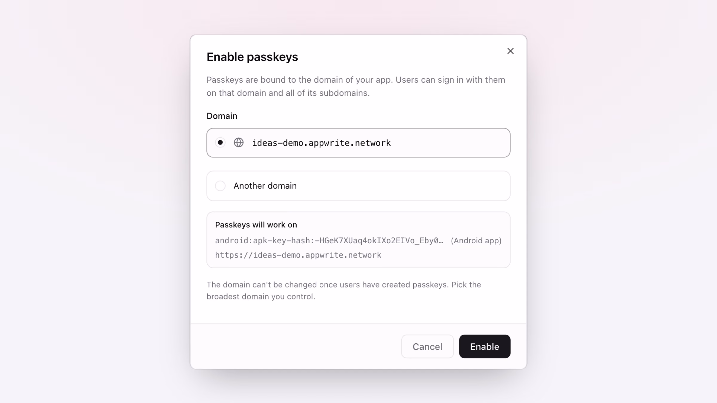 The Enable passkeys dialog suggesting a domain from the project's web platforms