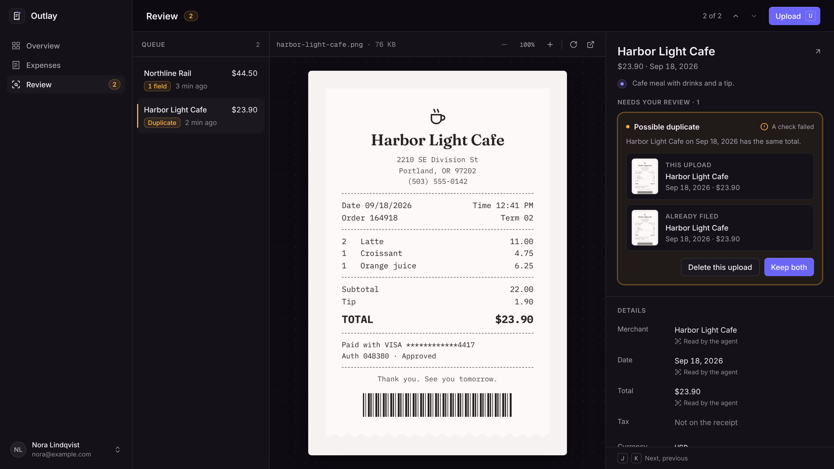 A possible duplicate in the Outlay review queue, comparing a Harbor Light Cafe upload with the expense already filed on September 18