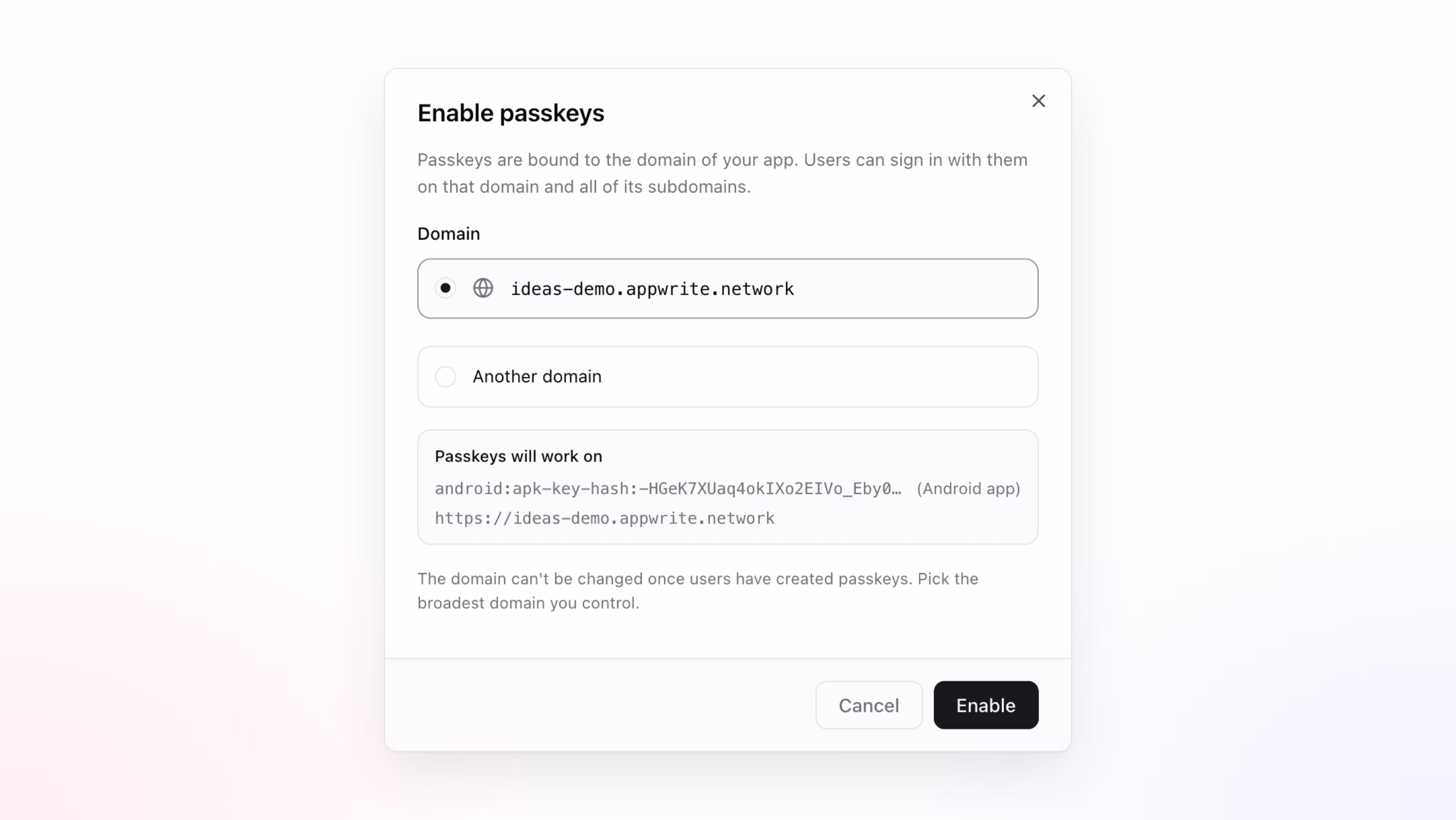 The Enable passkeys dialog suggesting a domain from the project's web platforms